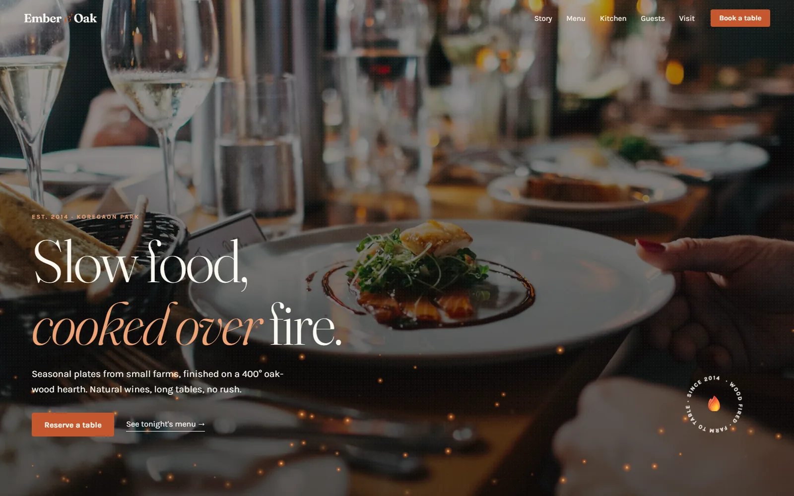 Restaurant website home page with the headline "Slow food, cooked over fire." over a plated dish, and a Reserve a table button